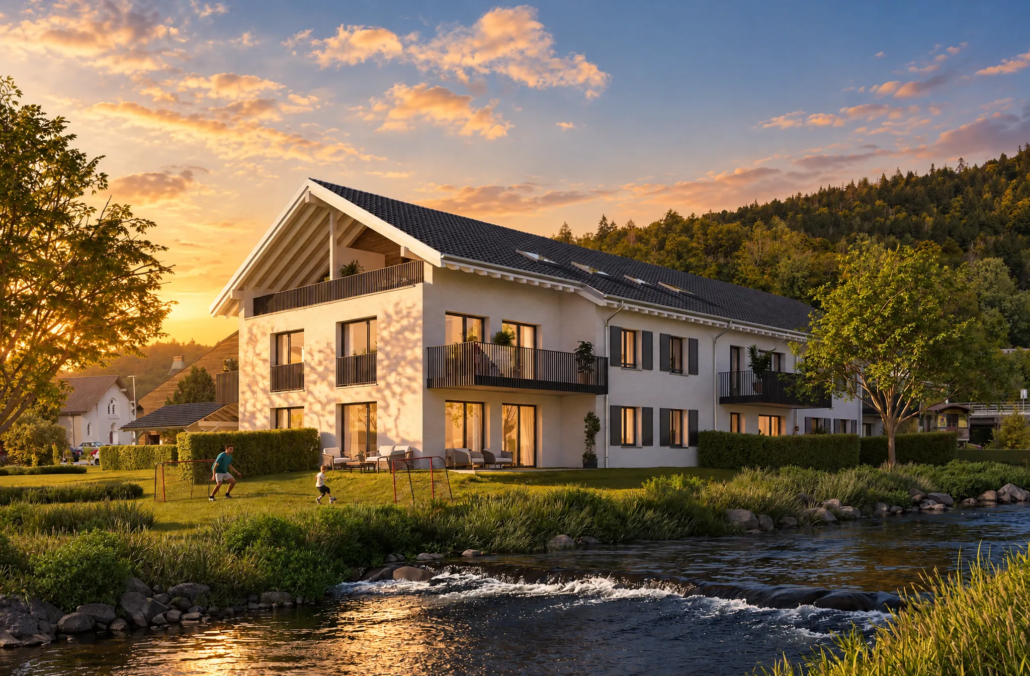 La résidence côté rivière au coucher du soleil
